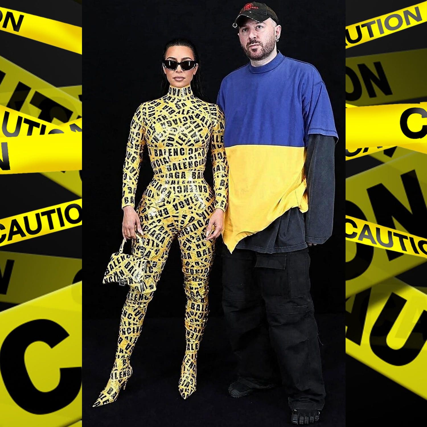 Kim Kardashian in yellow Caution Tape outfit with Demna at the Balenciaga Fall Winter 2022-2023 - Le Bourget in Paris, France Runway Magazine